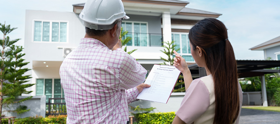 Homeowner in discussion with contractor.