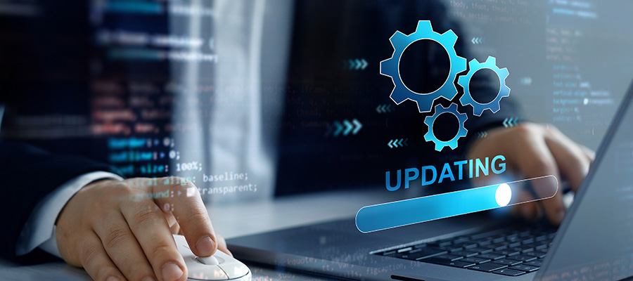 Man waiting for his computer to perform software updates.